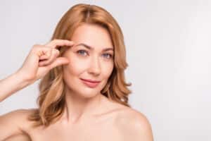 Woman with smooth skin after getting Botox or Dysport injectable treatment.